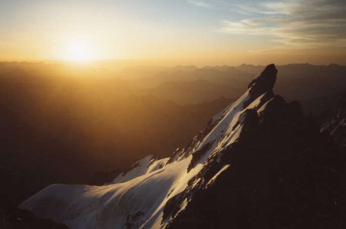 doigt de dieu from grand pic with sunrise after biwac at the top